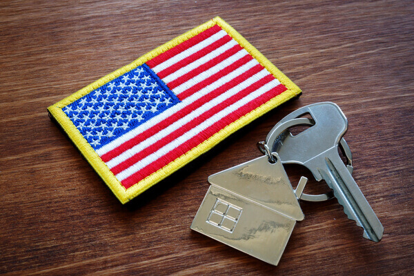 Military patch next to set of keys after getting a VA loan