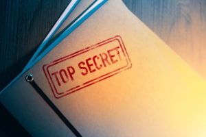 Top secret documents in envelope that can only be accessed by someone with a military security clearance