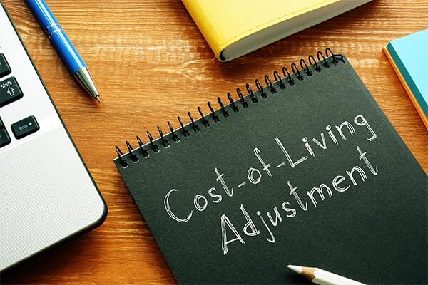 Journal that says "Cost of Living Adjustment" on the cover