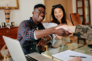 Young man signing up for the military and receiving a bonus