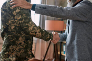 Veteran shaking hands after being discharged from service