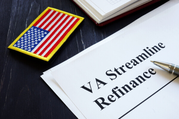VA streamline refinance loan paperwork sitting on desk