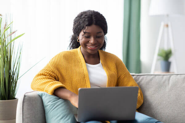 Military spouse searching on computer