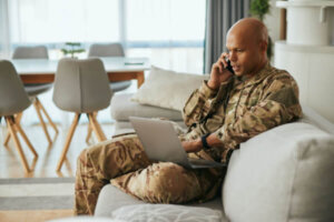 Military servicemember on the phone