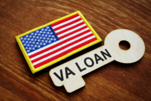 American flag patch next to key with VA loan written on it